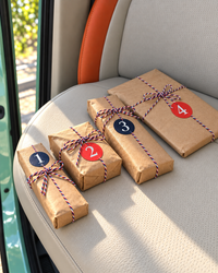 The parcels: numbered kraft Carpool parcels tied with twine